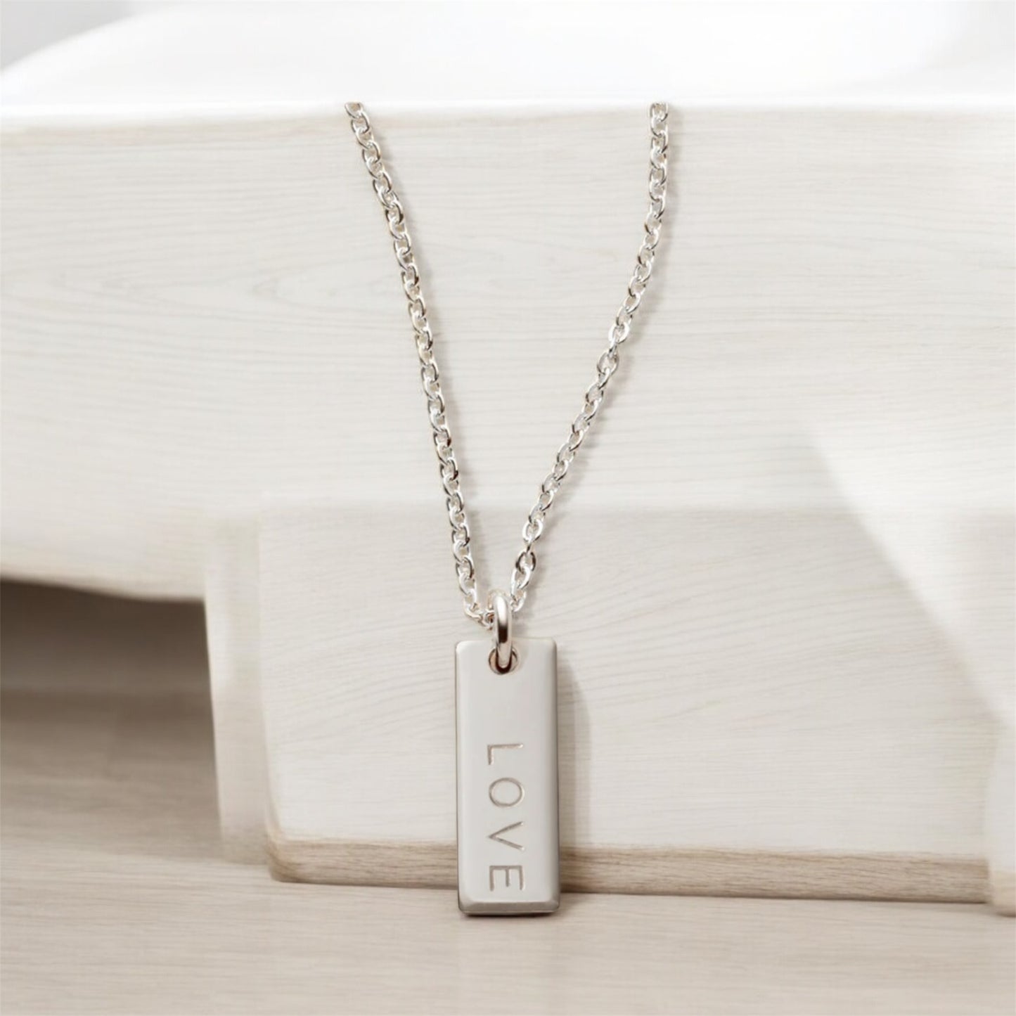 Single bar name stamped necklace